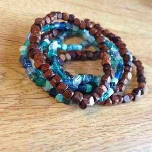 Six blue and brown stretch bangle bracelets