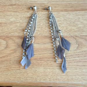 Studs with feather dangles.