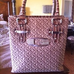 SOLD.... Guess purse with crystal covered G.