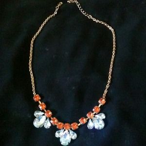 Chic goldtone orange and clear stone necklace!