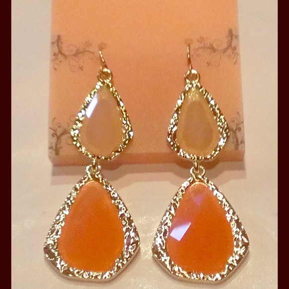 On trendy, two tone earrings