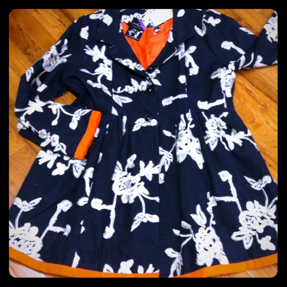 Flirty spring coat. Never worn, new with tags.