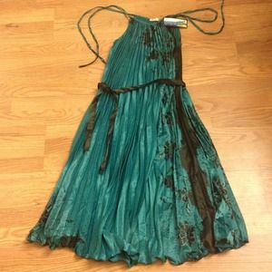 NEW turquoise accordion dress with tie straps.