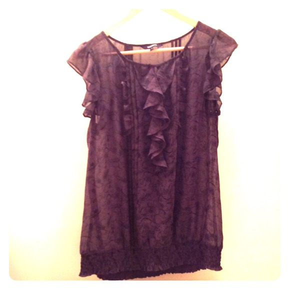 **Sold**Ruffled blouse