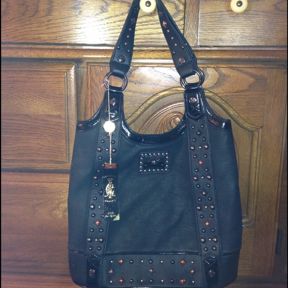 A bucket bag by Christian Audigier