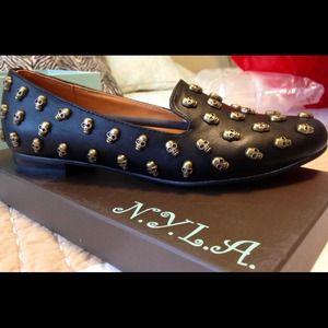 N.Y.L.A black loafers with silver skull hardware.