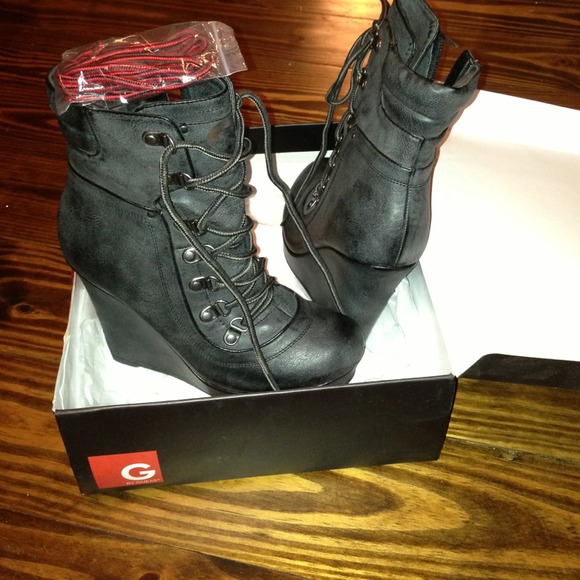 Guess Brand Black Wedge Boots. 😍Never been worn😍