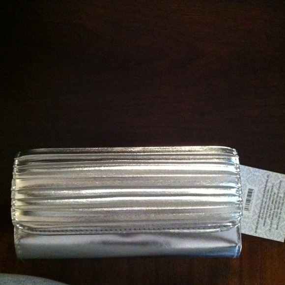 New silver Clutch **Sold**
