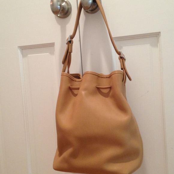 Vintage tan leather coach bucket
