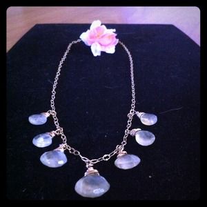 Lime quarts with suspended wrapped flower