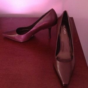 Dark brown leather pumps