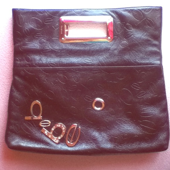 BEBE large leather clutch