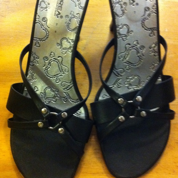 Black sandles you can use with pants or. Dress