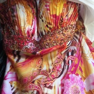 Prom dress: pink, orange, yellow brown tones