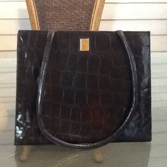 A black furla purse.