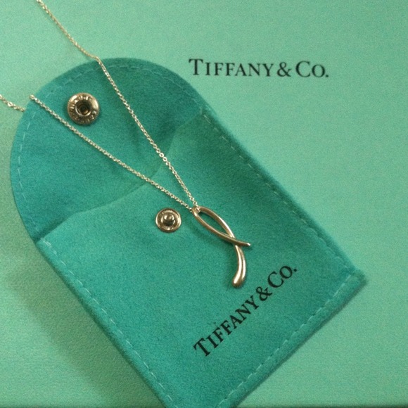 ...Tiffany & Co. Cursive L necklace...
