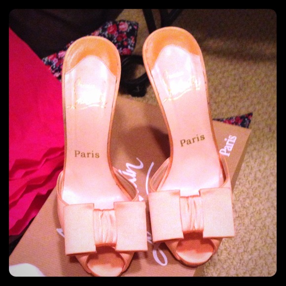 Peach satin Christian Louboutin heels, size 7.5