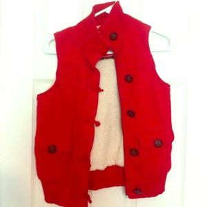 SOLD!Thick soft red w ivory fur vest w brown butto