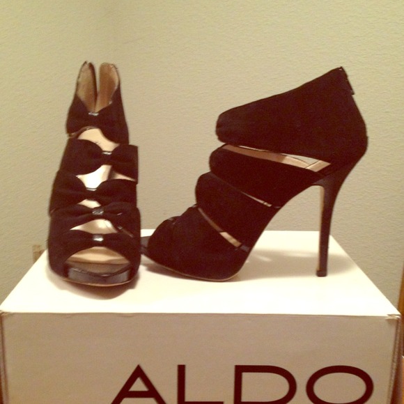 ALDO Shoes - Black booties with bowtie detail.