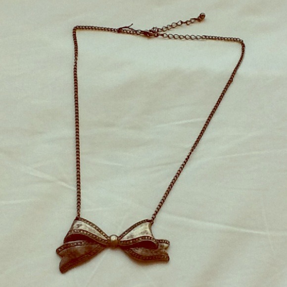 Copper ribbon bow necklace