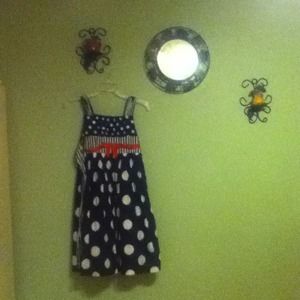 Adorable polka dot dress with red bow