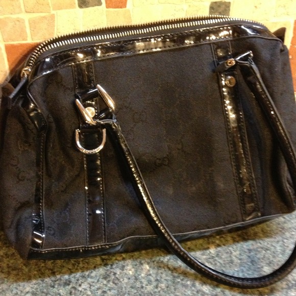 Gucci Black Fabric & Leather handbag. Priced lower