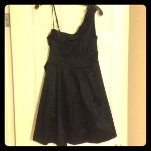Black cocktail dress with one shoulder detail
