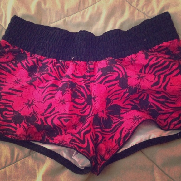 Xhileration beach/swim suit shorts. Pink and black