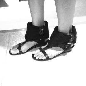 Report black rocker sandals and Hawaiian Bracelets
