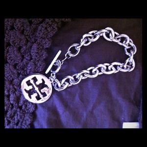 Faux Tory Burch silver tone bracelet
