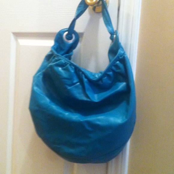 Deep aqua colored handbag