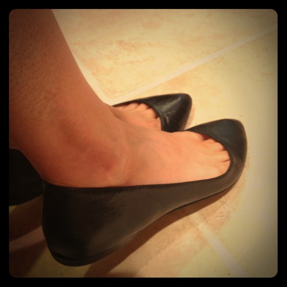 Dolce Vita black leather flats.