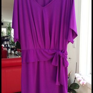 Magenta dress with waist bow.