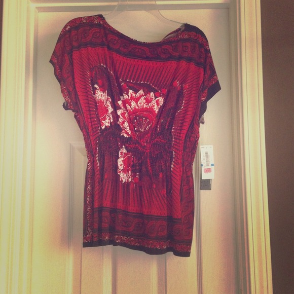 Brand new Takara top. Never been worn