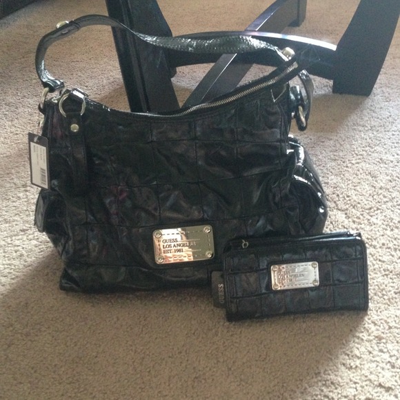 Shiny black Guess purse and wallet