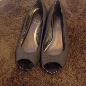 Chocolate brown shoes w/ wedge heel.