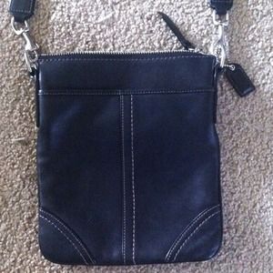 Coach black leather cross body bag.