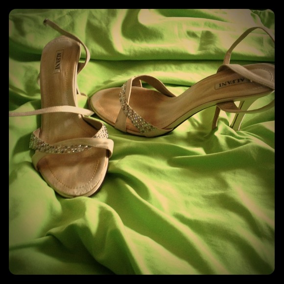 Cream heel. Rhinestone strap.