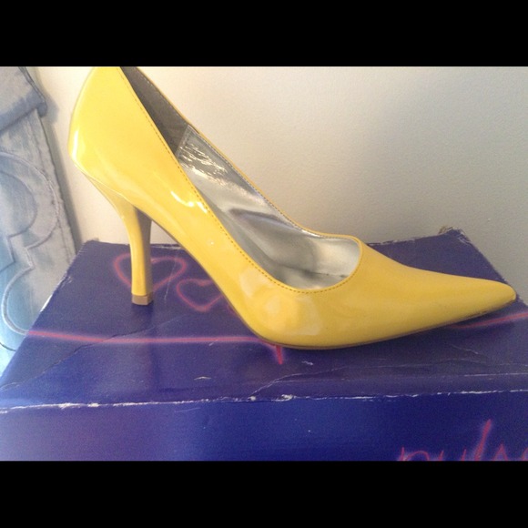 Yellow patent leather pumps