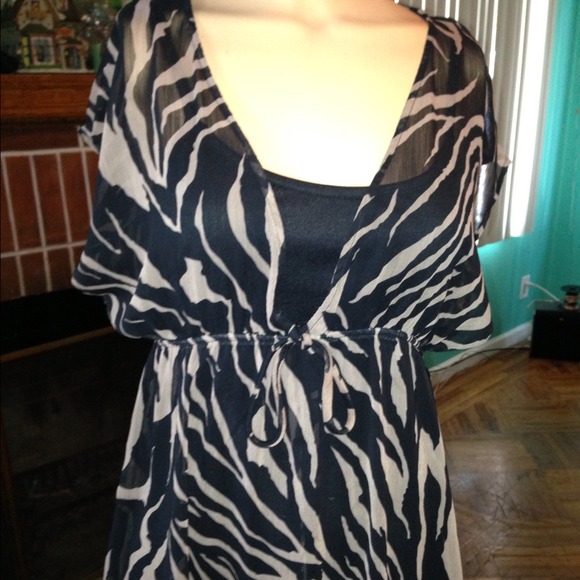 SOLD!! Beautiful double shirt with zebra print.