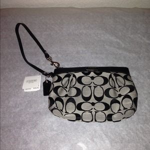 Signature Coach Wristlet. NWT