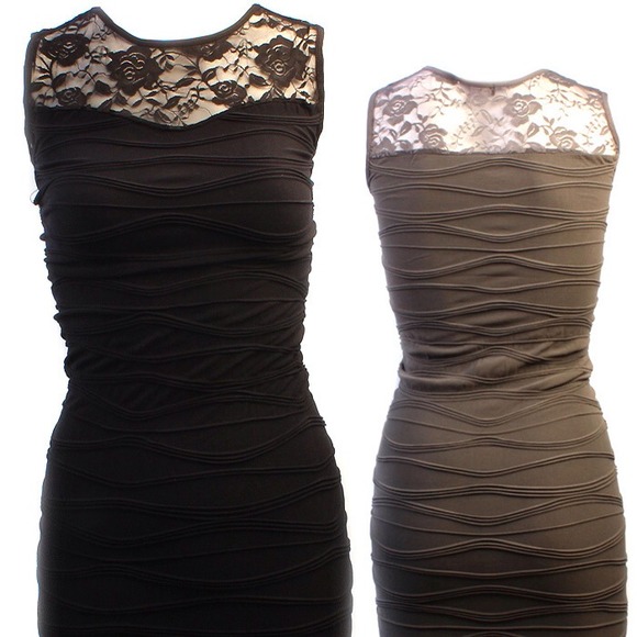 Black dress.Same as the one in the middle.