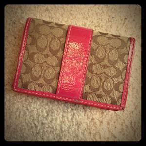 Authentic Coach mini wallet in tan/pink color