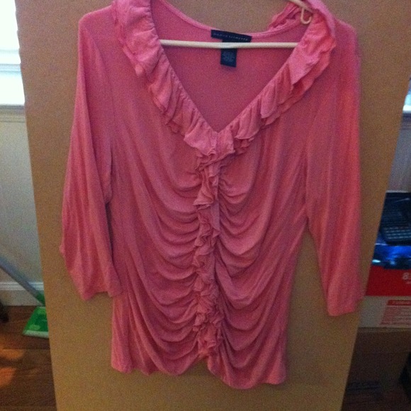 Pink ruffled top.