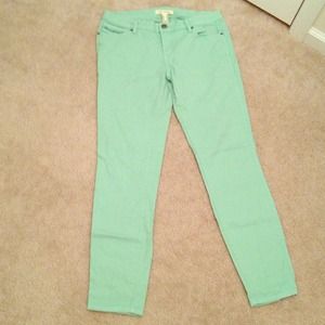 Mint green skinny jeans.