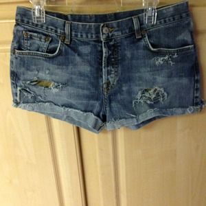 Distressed denim shorts