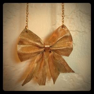 Golden bow necklace