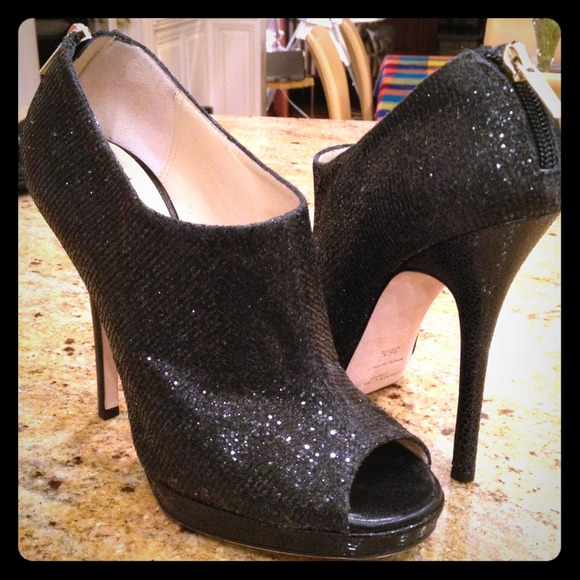 Jimmy Choo- Peep toe booties.