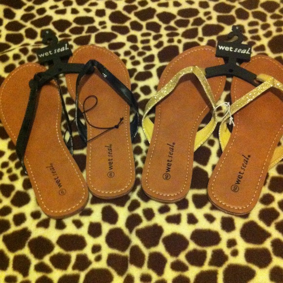 Black ones on hold. Wet seal flip flops
