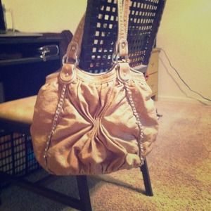 Tan purse with chain on either sides